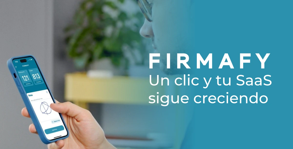firmafy-firma-electronica-movil Profesional firmando electrónicamente desde un dispositivo móvil<br />
en entorno de trabajo moderno